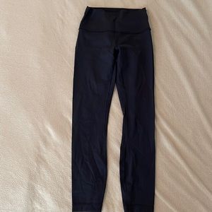 Lululemon black leggings size 4. Worn once and in great condition.